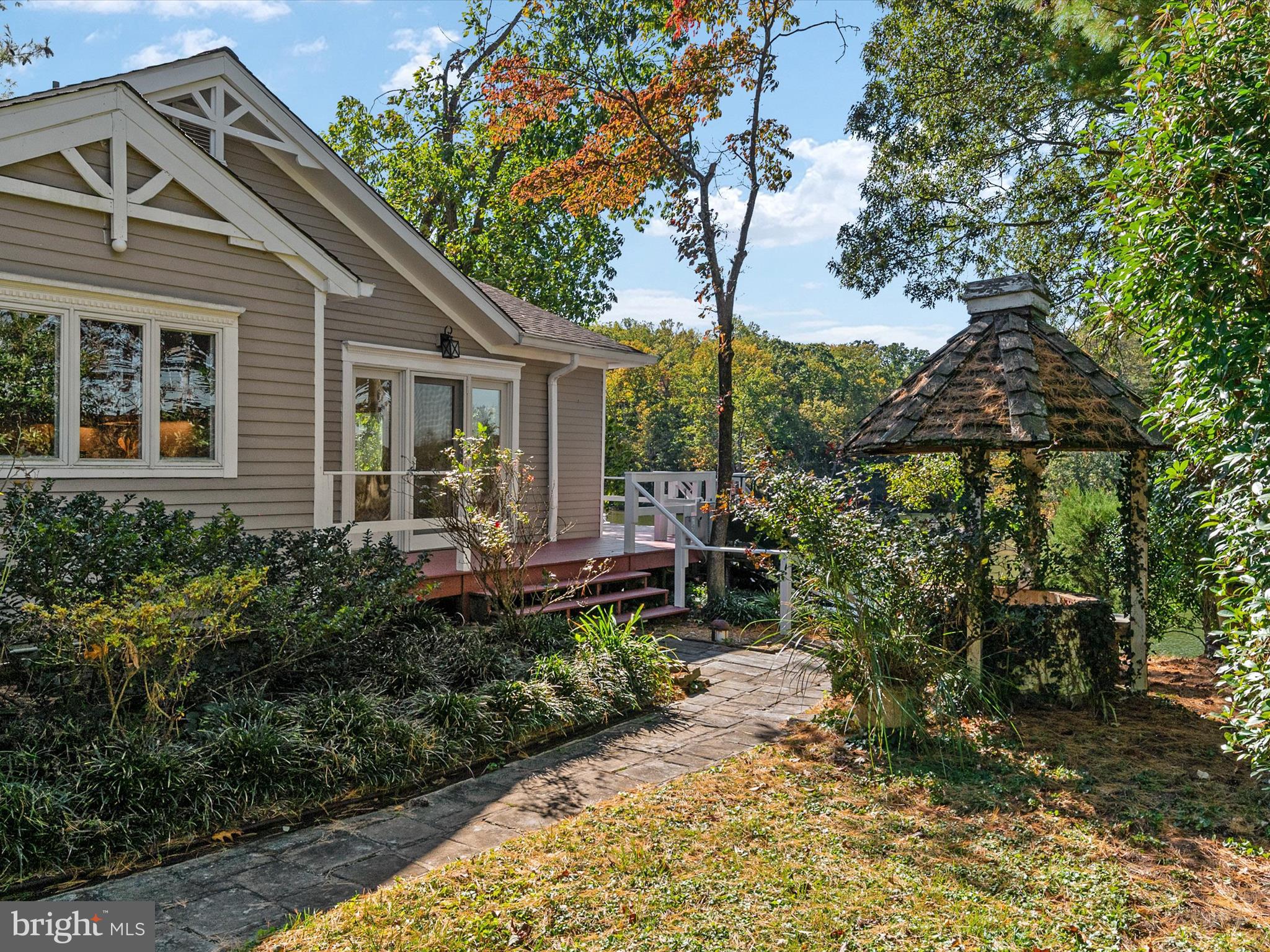 111 Virginia Avenue Edgewater, MD 21037 - Photo 41 of 80 a view of a house with backyard sitting area and garden