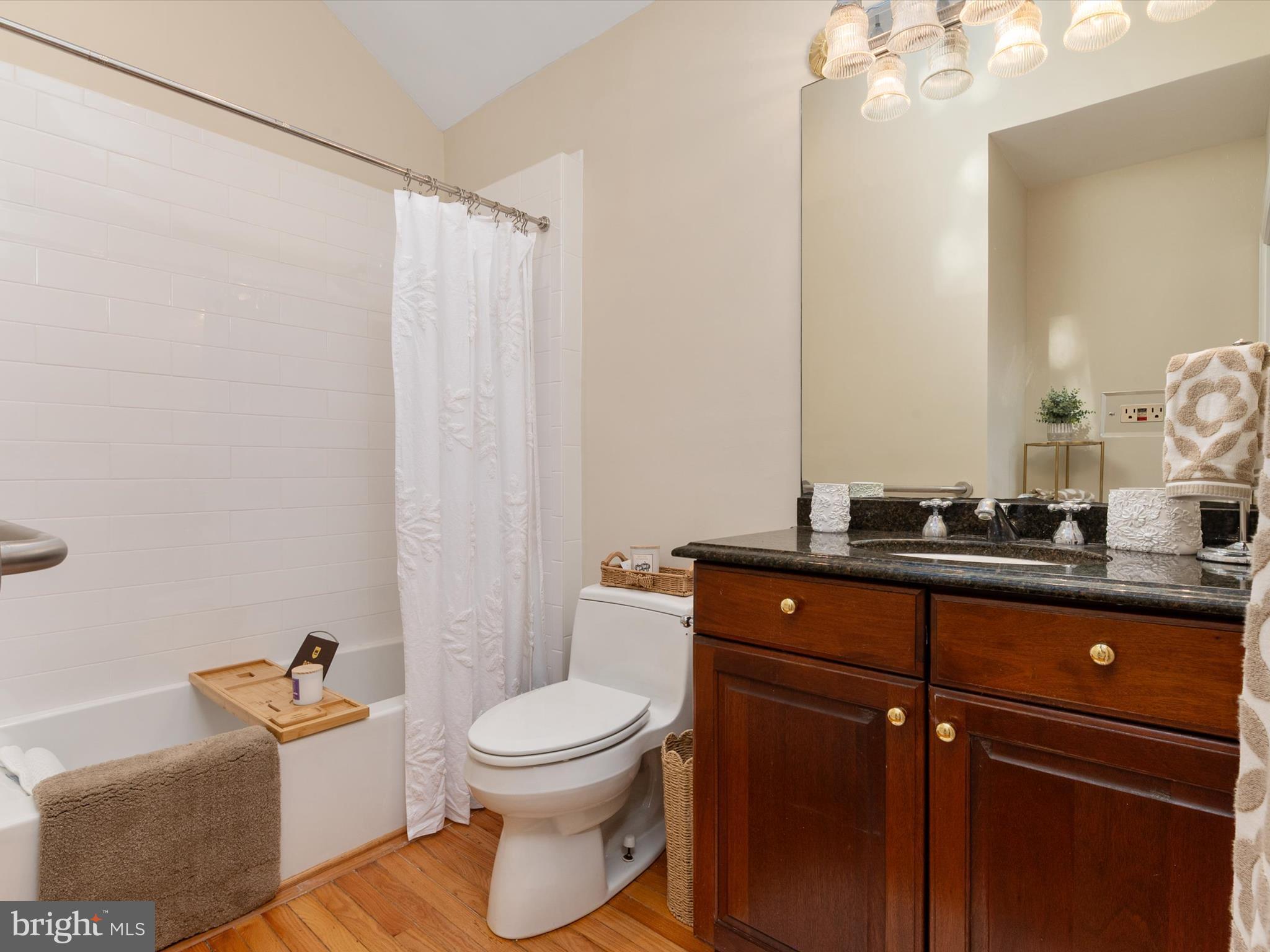 111 Virginia Avenue Edgewater, MD 21037 - Photo 49 of 80 a bathroom with a toilet a sink and bathtub