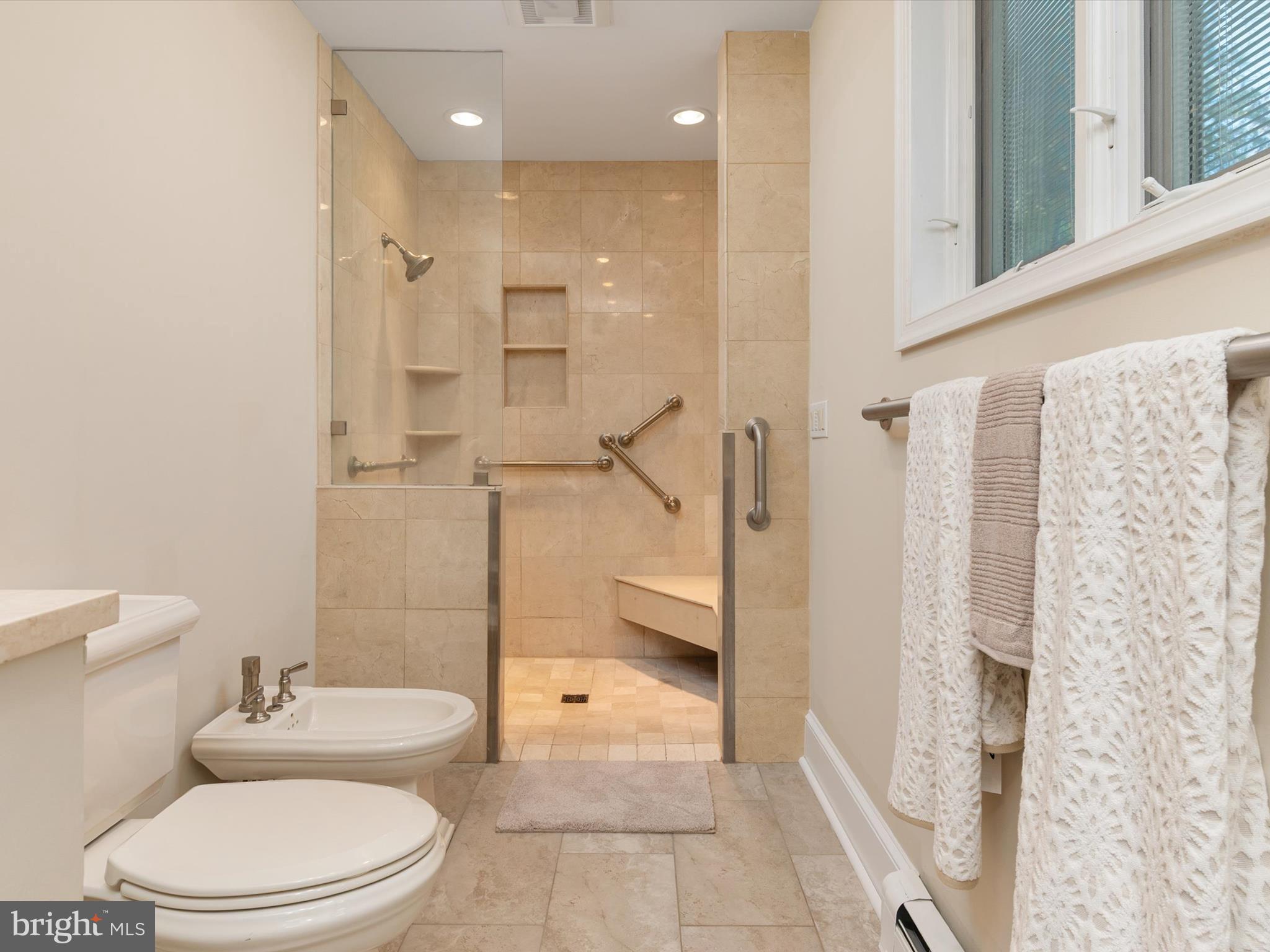 111 Virginia Avenue Edgewater, MD 21037 - Photo 53 of 80 a bathroom with a toilet a sink and shower