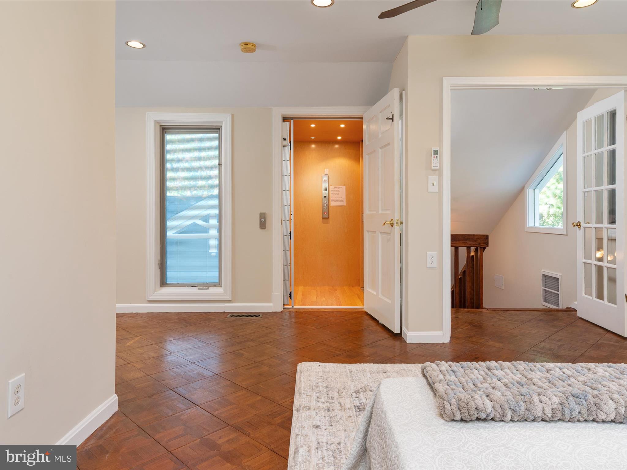 111 Virginia Avenue Edgewater, MD 21037 - Photo 56 of 80 a living room with a bed and a window