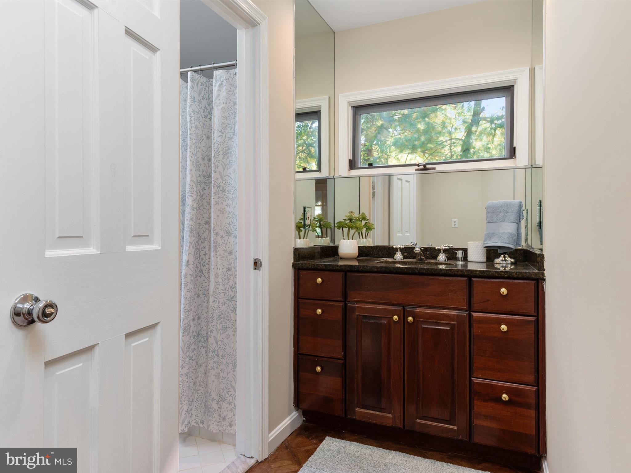 111 Virginia Avenue Edgewater, MD 21037 - Photo 57 of 80 a kitchen with a sink and cabinets