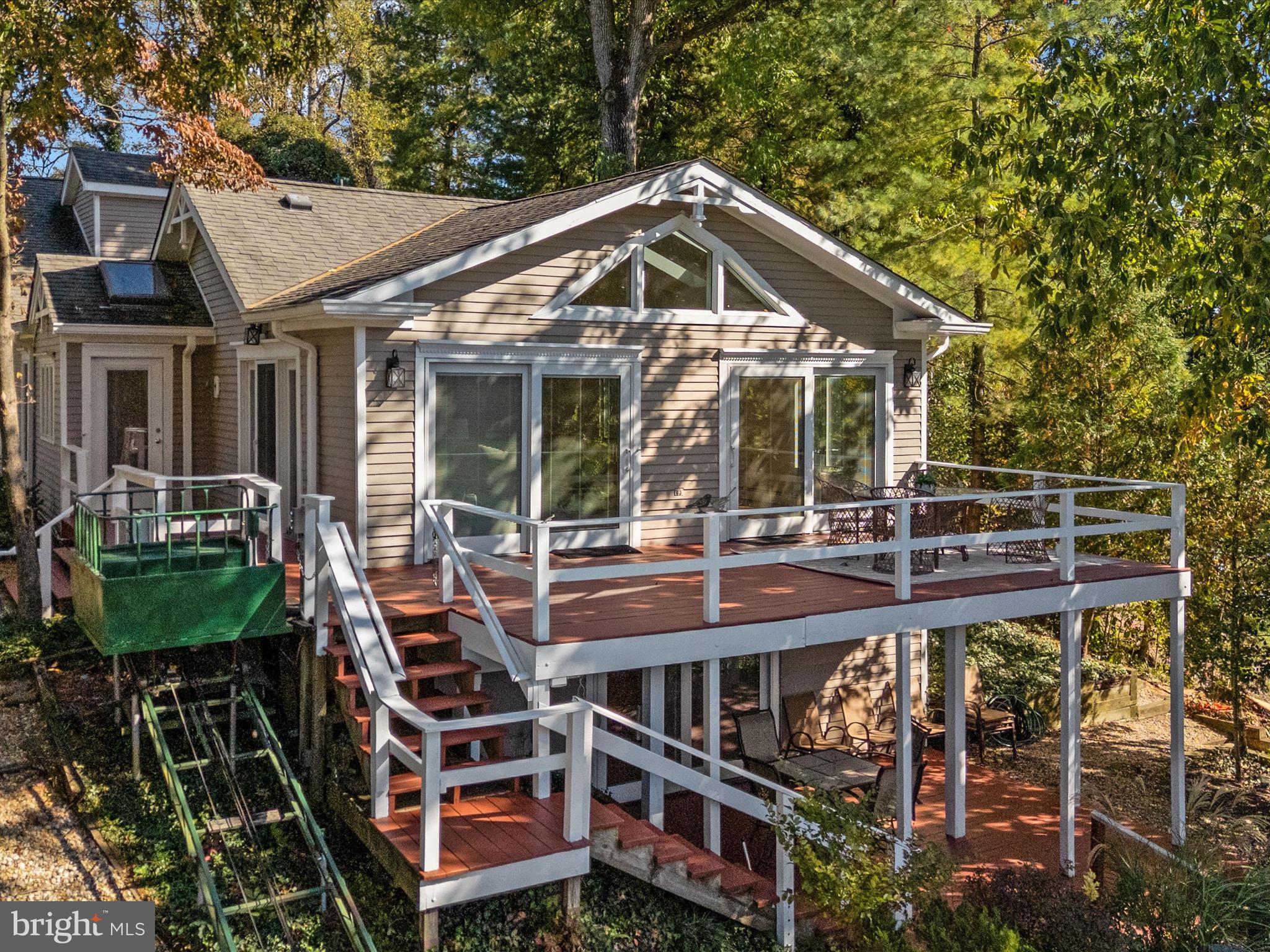 111 Virginia Avenue Edgewater, MD 21037 - Photo 74 of 80 a front view of a house with yard and staircase