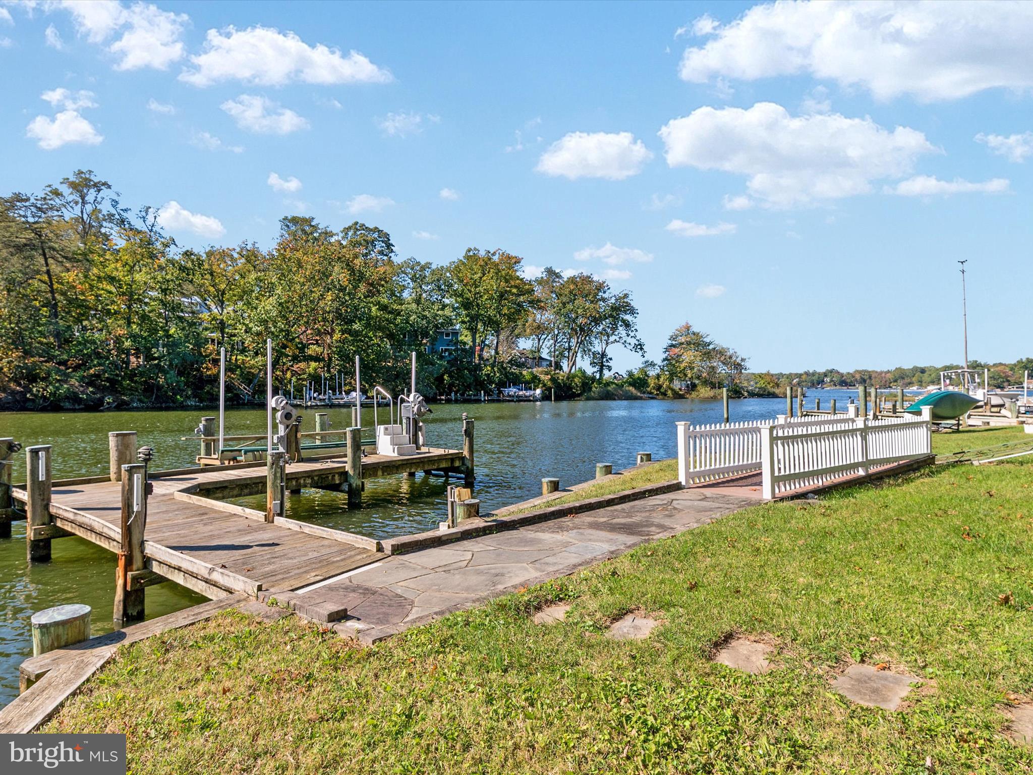 111 Virginia Avenue Edgewater, MD 21037 - Photo 76 of 80 a view of a garden with wooden fence