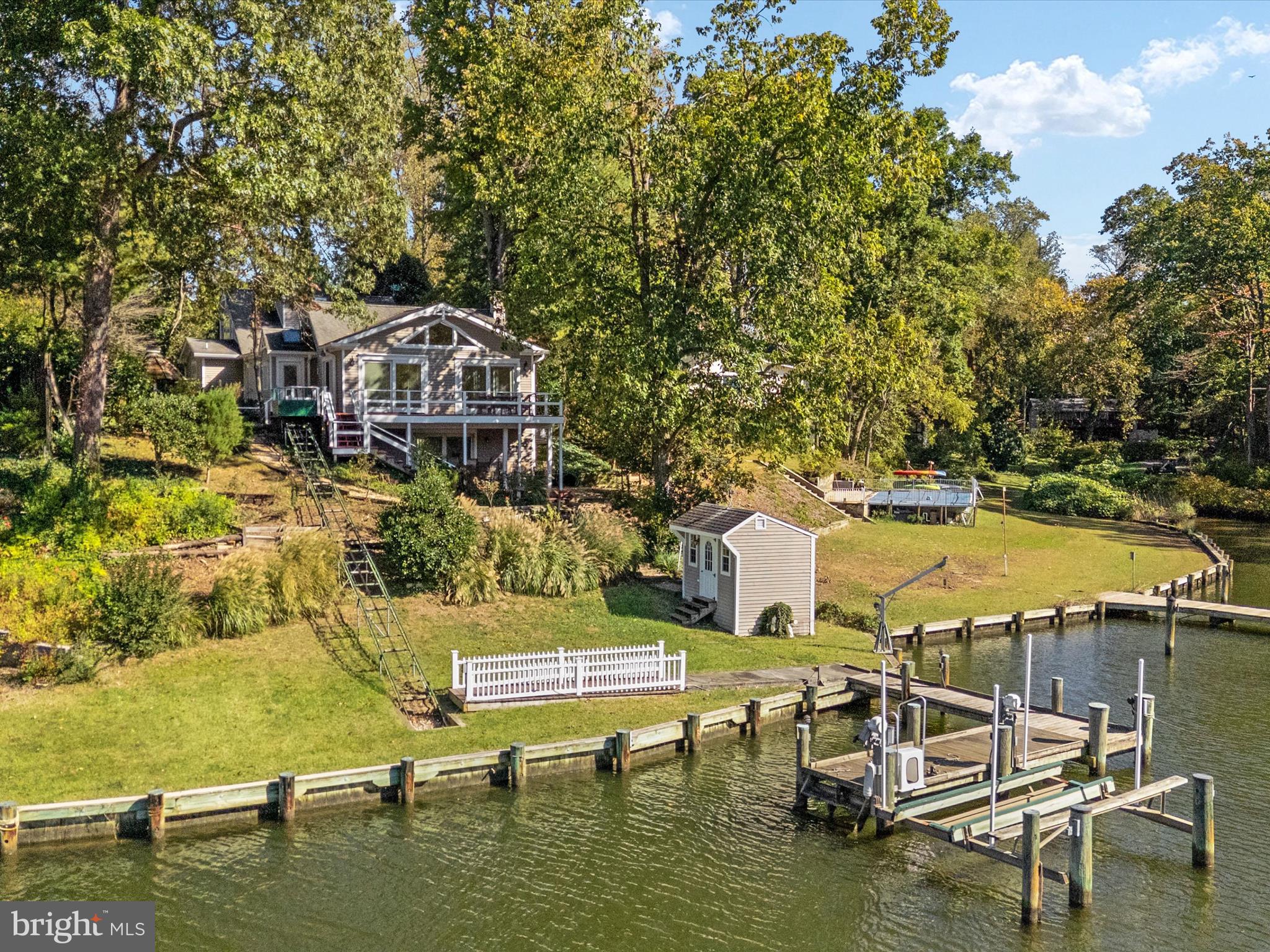 111 Virginia Avenue Edgewater, MD 21037 - Photo 77 of 80 a swimming pool with outdoor seating and yard