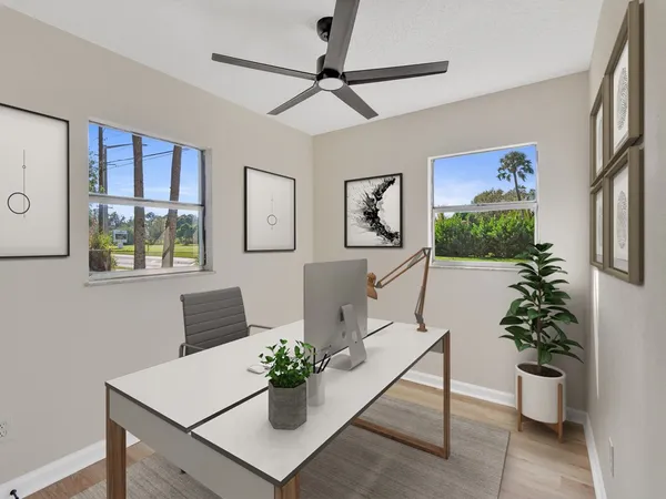 a living room with furniture and window