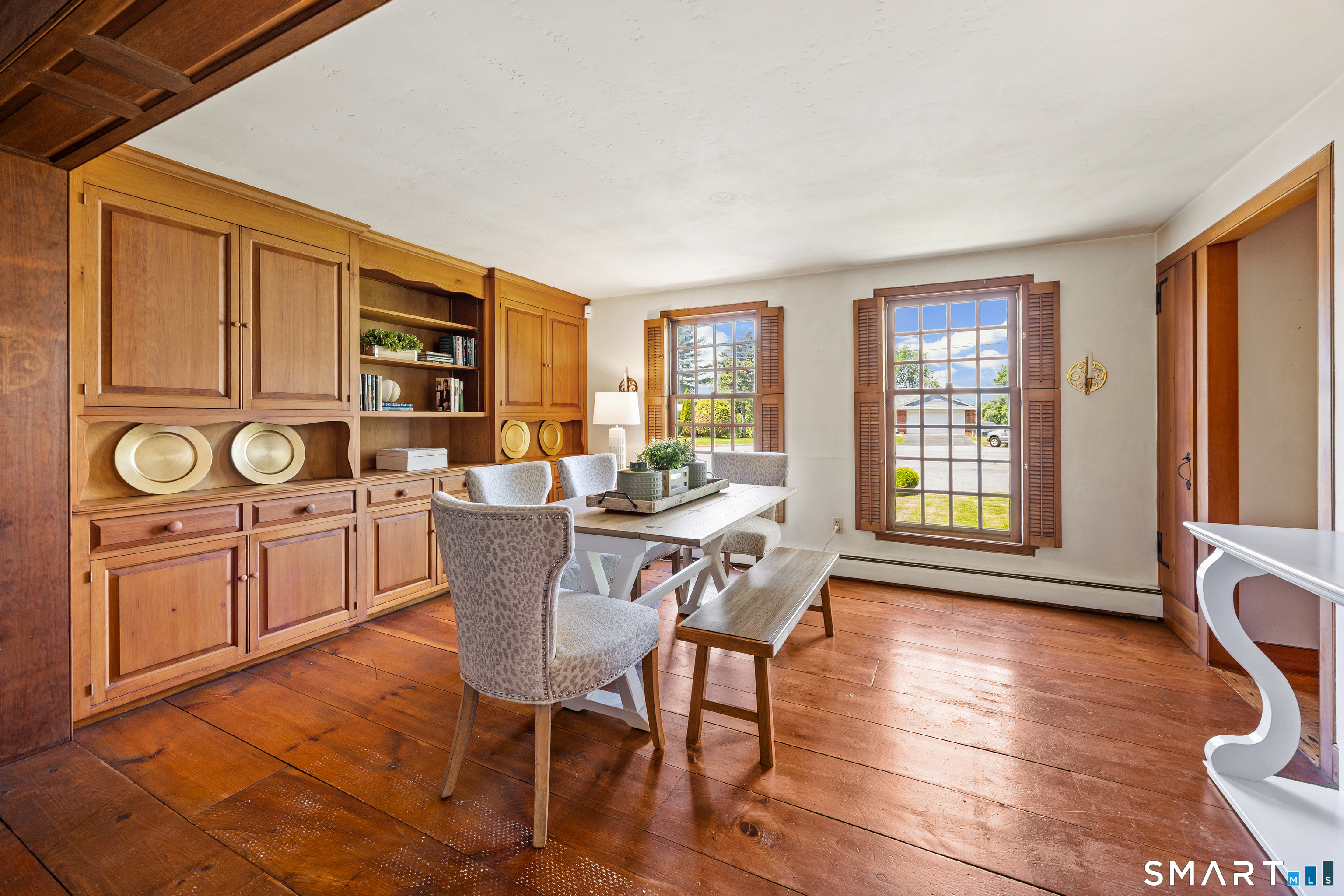 52 Susan Lane Meriden, CT 06450 - Photo 4 of 28 a dining room with furniture a window and wooden floor