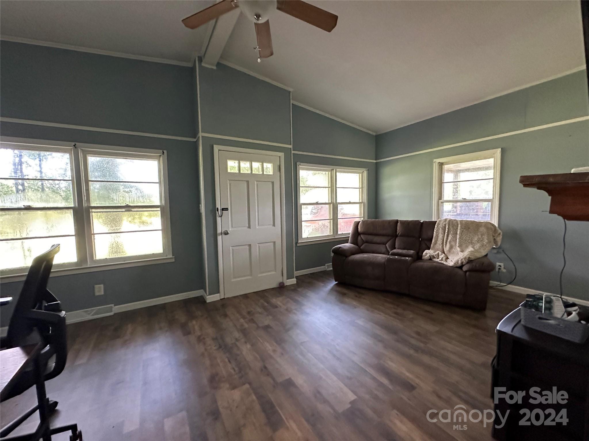 5809 Wolf Pond Road Monroe, NC 28112 - Photo 9 of 19 a living room with furniture and a window