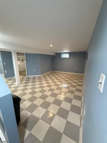 a view of a livingroom with a workspace