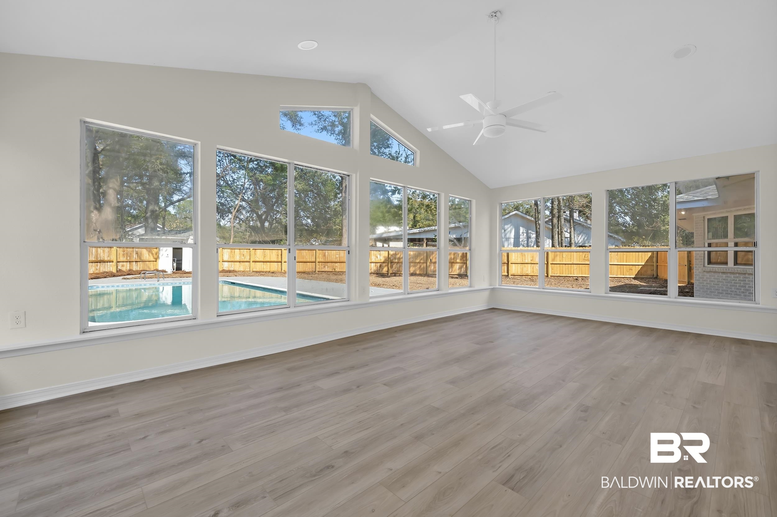 1409 Altair Lane Mobile, AL 36693 - Photo 4 of 23 Unfurnished sunroom featuring ceiling fan
