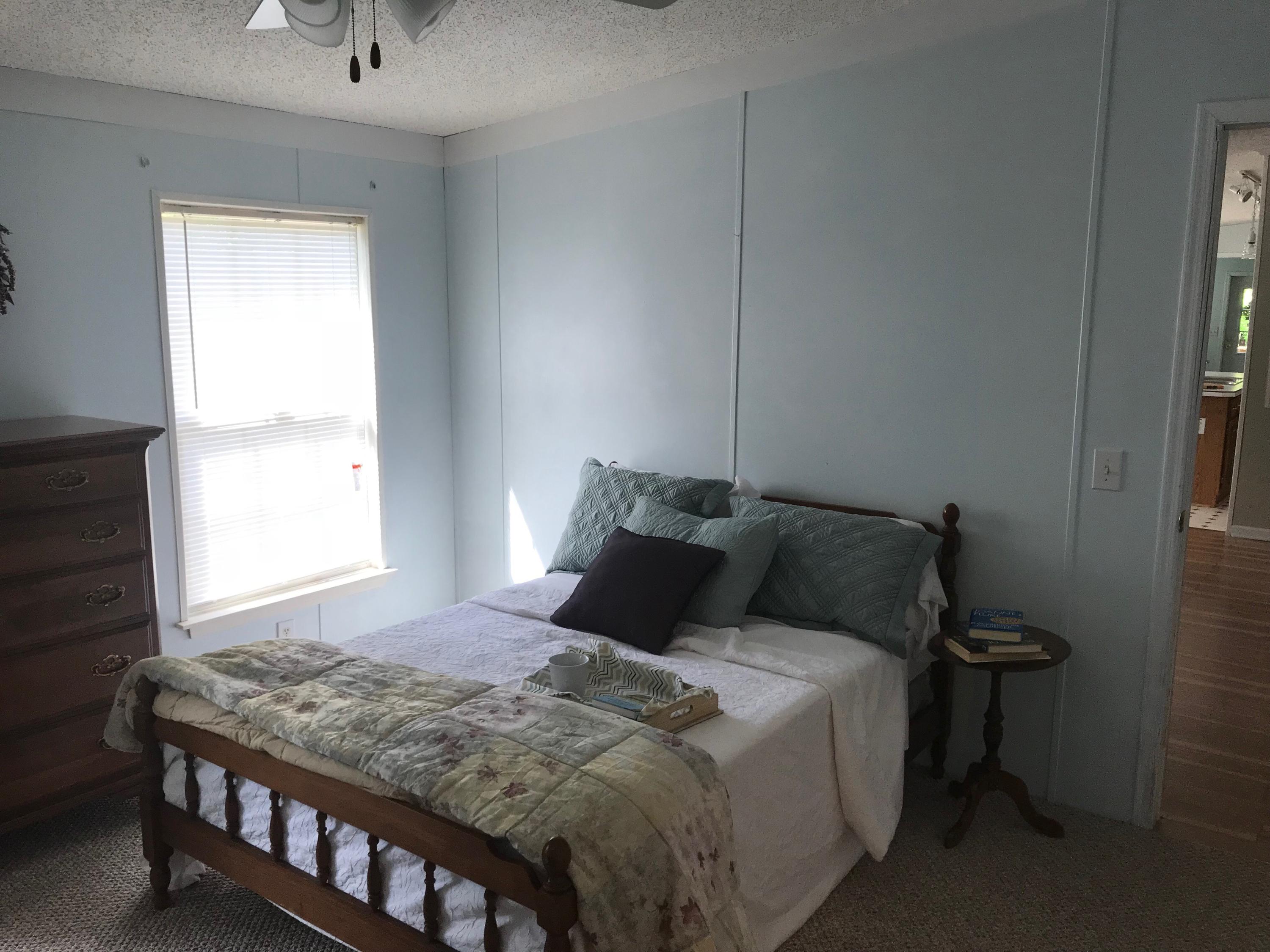 543 Isolane Road Callaway, VA 24067 - Photo 14 of 23 a bedroom with a bed and window