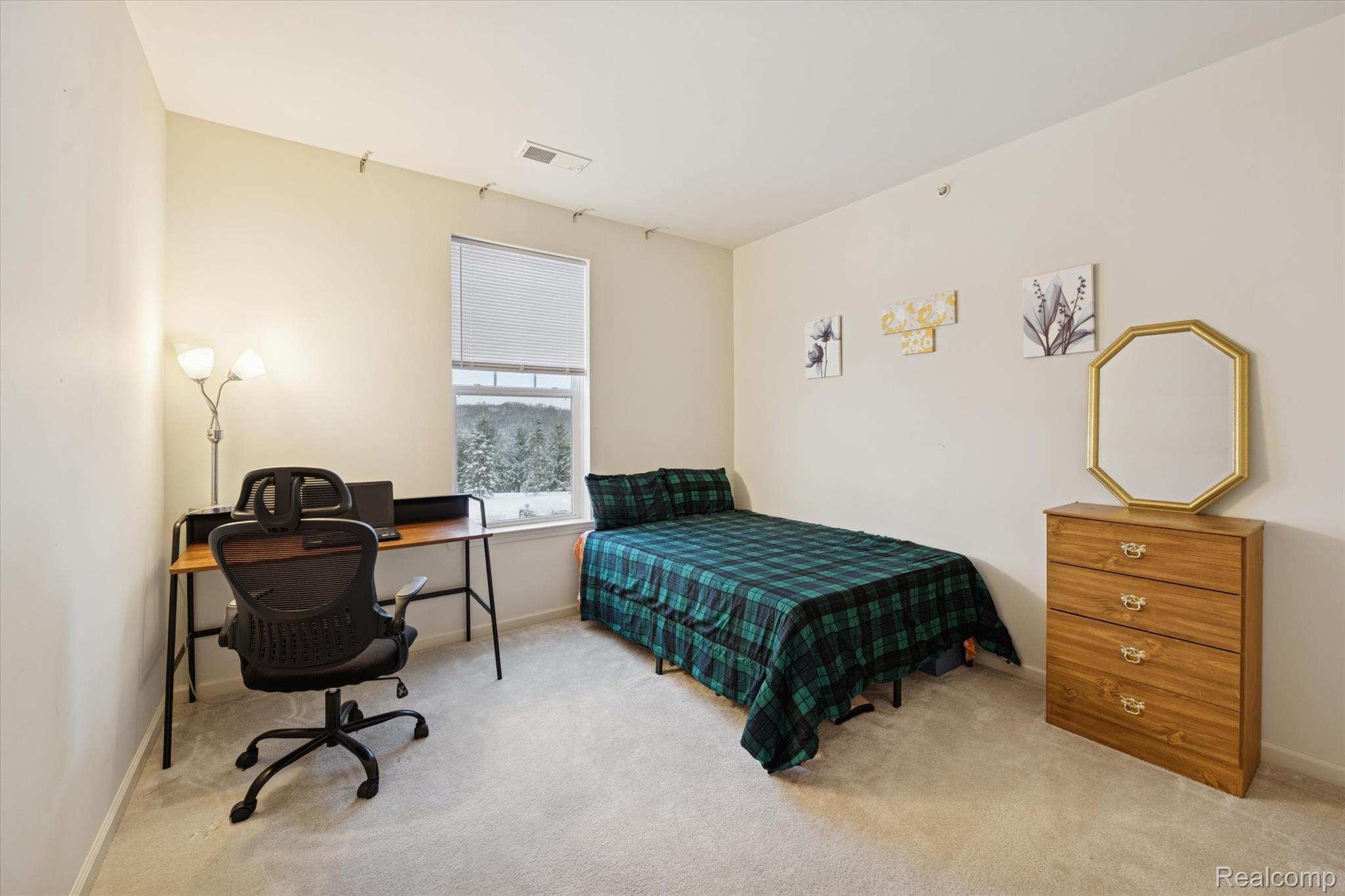10028 Ridge Run Street, Unit 10 Howell, MI 48855 - Photo 15 of 21 Bedroom 2, great for guests or home office.