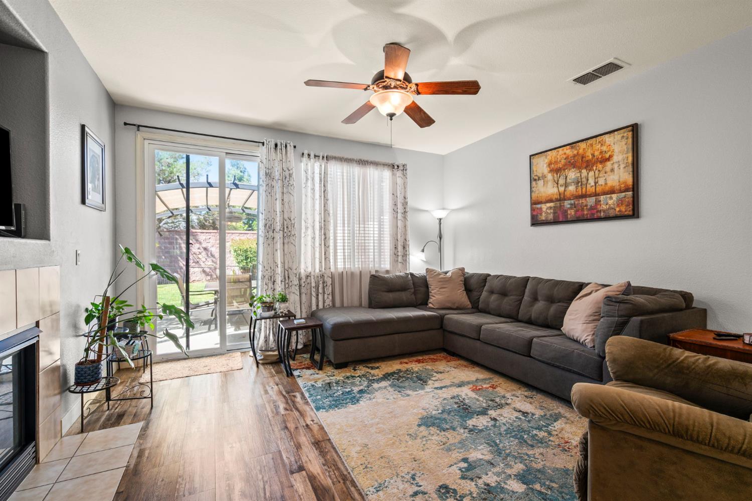 4403 Niobe Circle Rancho Cordova, CA 95742 - Photo 15 of 29 a living room with furniture and a large window
