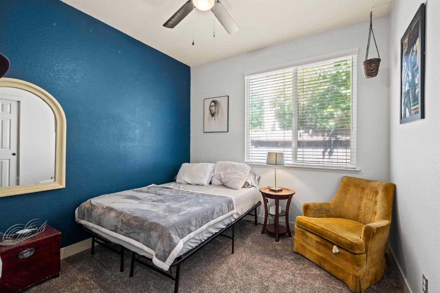 4403 Niobe Circle Rancho Cordova, CA 95742 - Photo 21 of 29 a bedroom with a bed and a couch