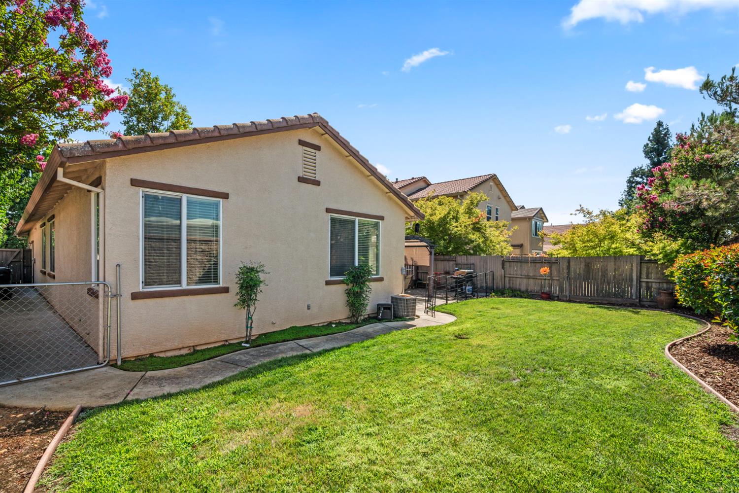 4403 Niobe Circle Rancho Cordova, CA 95742 - Photo 26 of 29 a view of a house with a yard and pathway