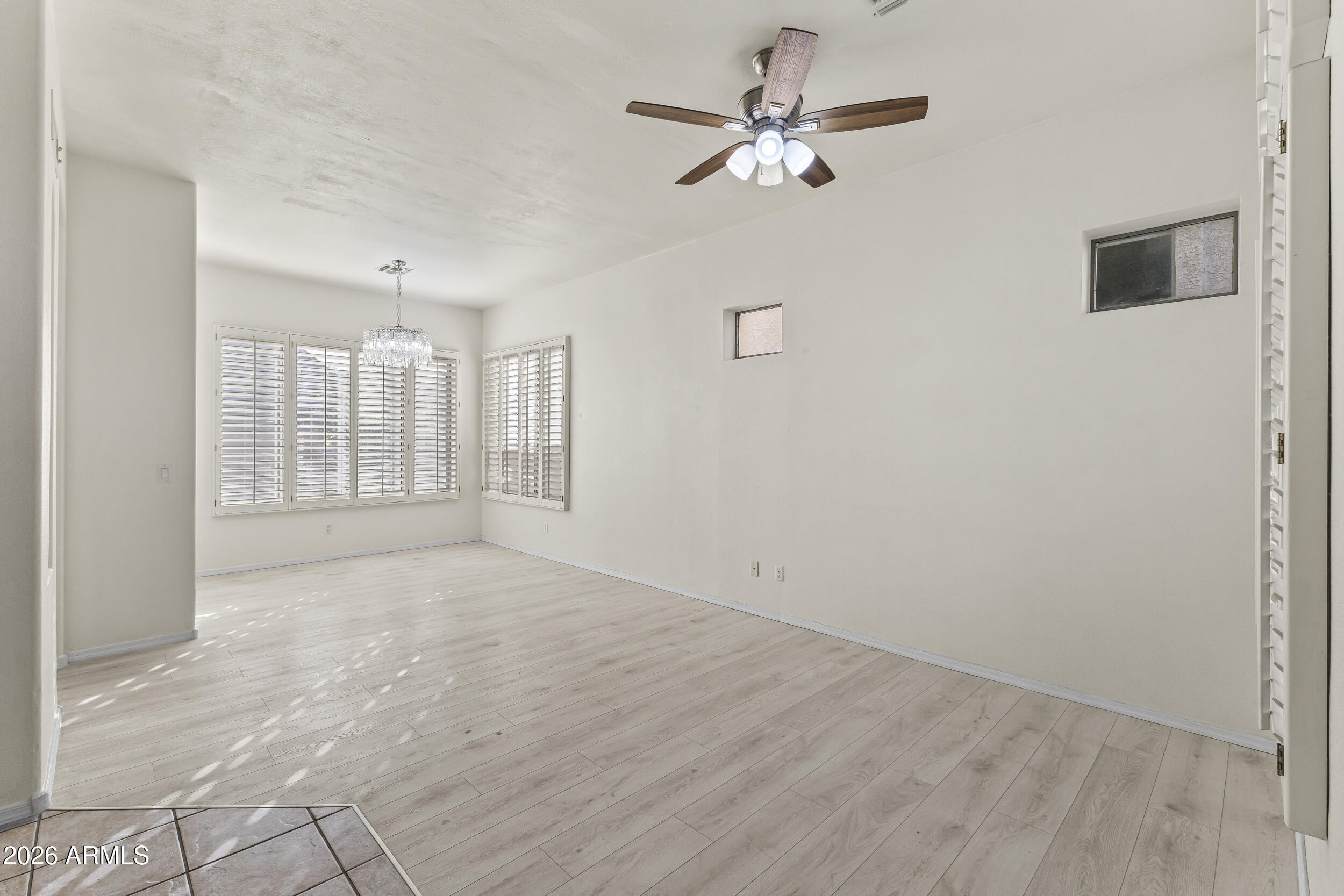17639 North 17th Street Phoenix, AZ 85022 - Photo 9 of 42 a view of an empty room with a window