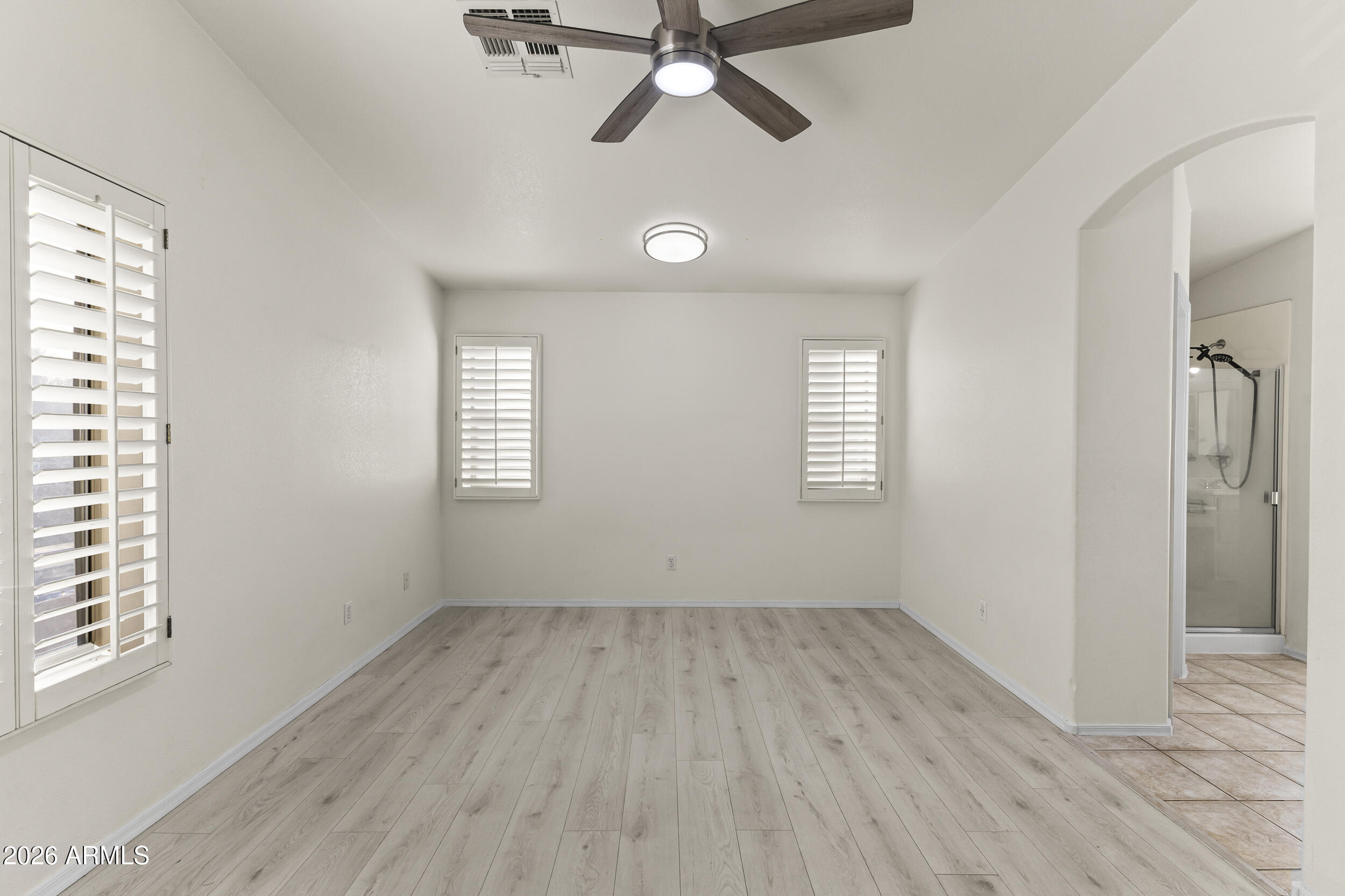 17639 North 17th Street Phoenix, AZ 85022 - Photo 23 of 42 wooden floor in an empty room with a window