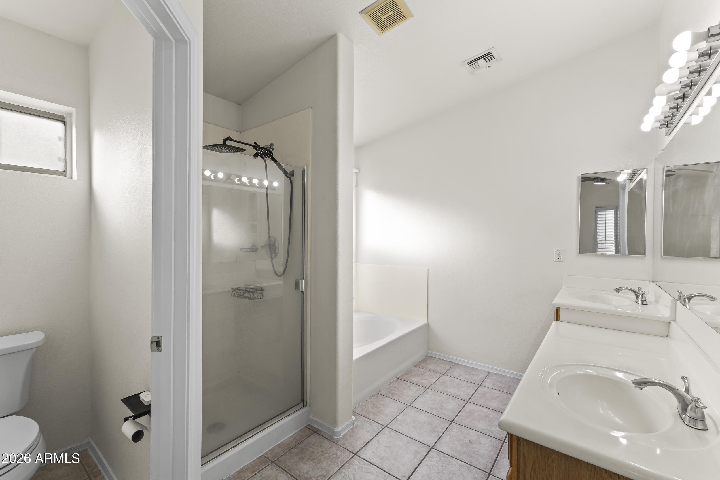 17639 North 17th Street Phoenix, AZ 85022 - Photo 24 of 42 a bathroom with a sink toilet and shower