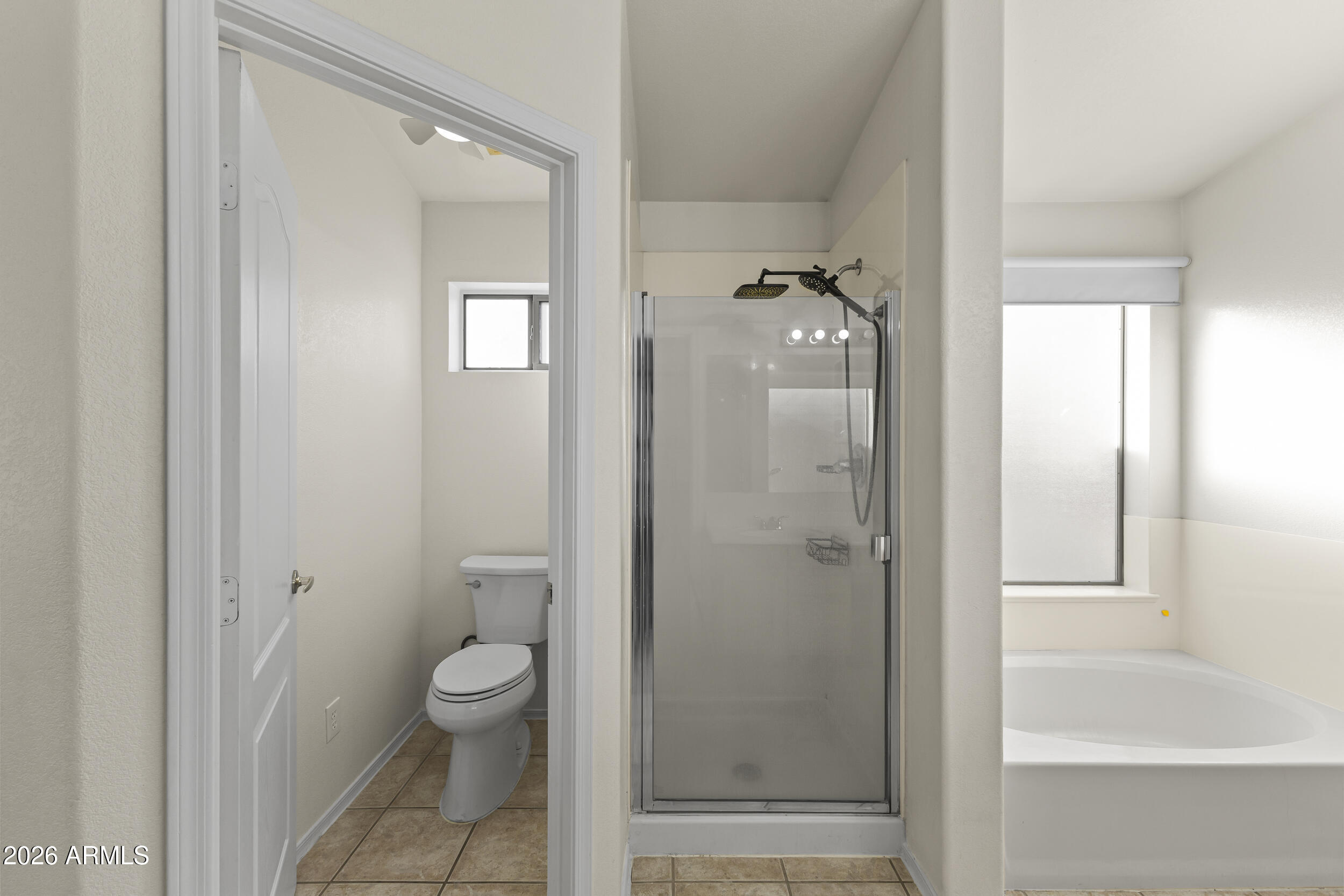 17639 North 17th Street Phoenix, AZ 85022 - Photo 26 of 42 a bathroom with a granite countertop toilet a sink and shower