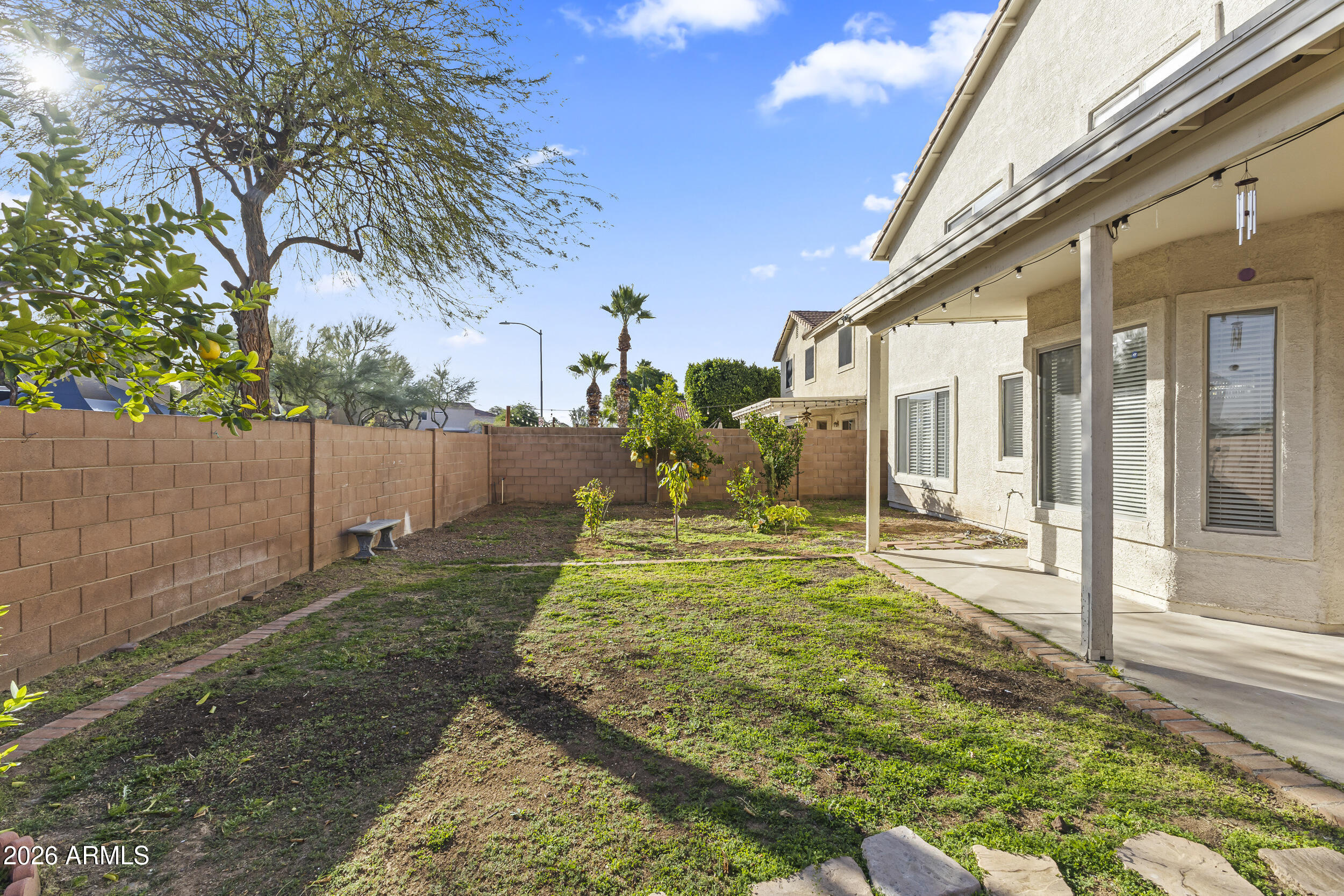 17639 North 17th Street Phoenix, AZ 85022 - Photo 35 of 42 a view of a backyard with a garden