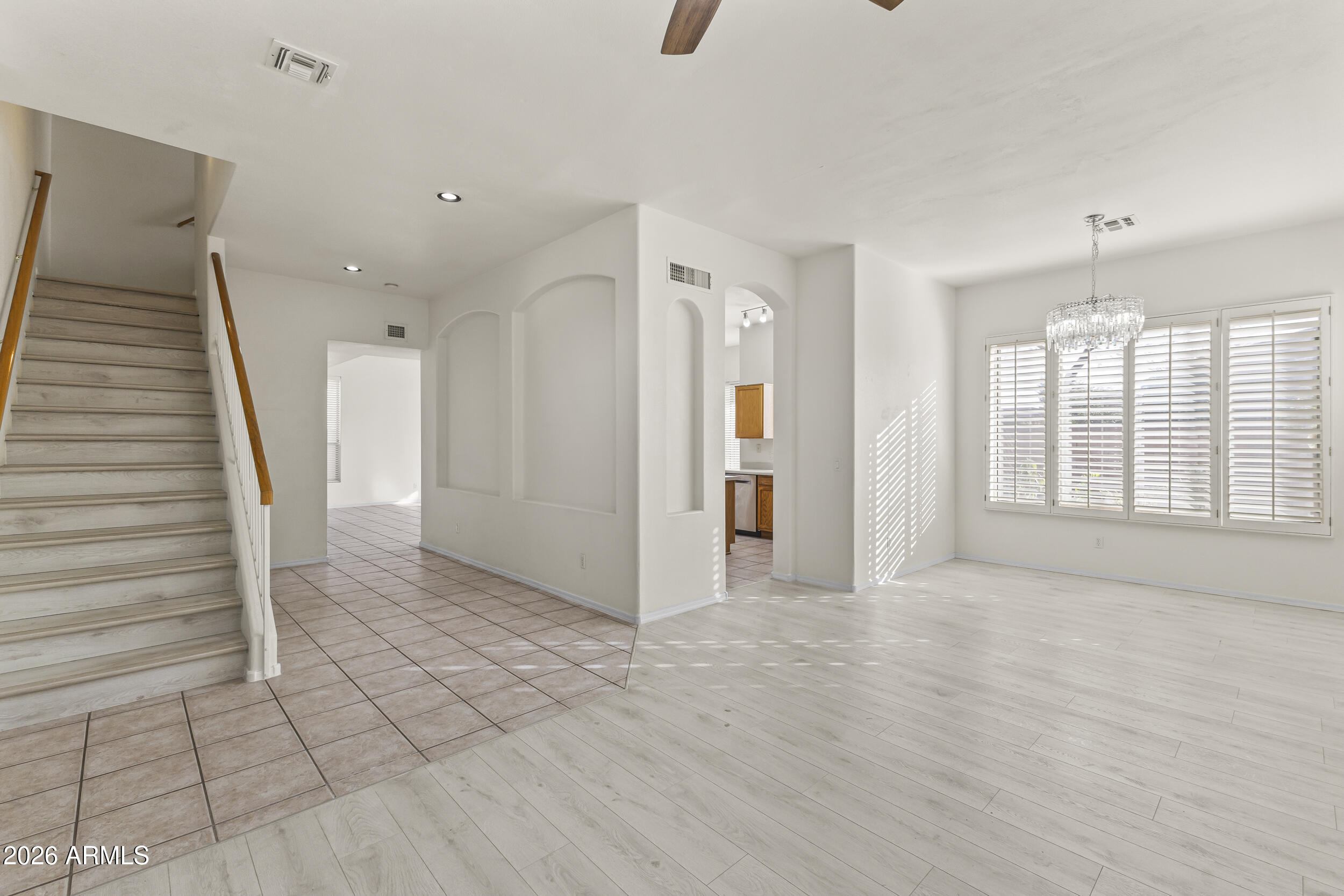 17639 North 17th Street Phoenix, AZ 85022 - Photo 6 of 42 a view of an empty room with a window