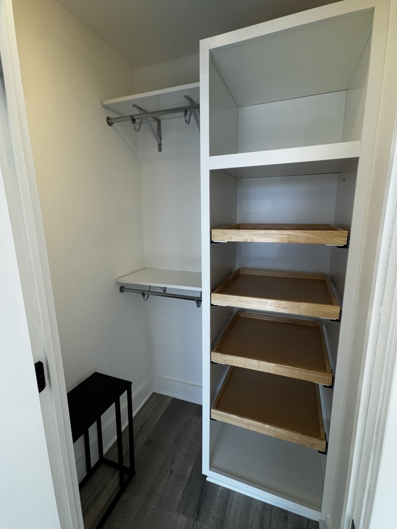 5415 North Sheridan Road, Unit 5414 Chicago, IL 60640 - Photo 14 of 18 a view of walk in closet with empty racks