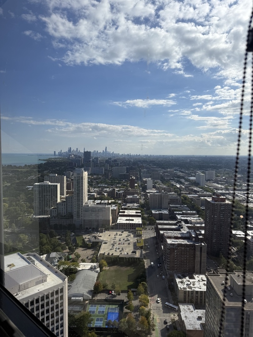 5415 North Sheridan Road, Unit 5414 Chicago, IL 60640 - Photo 8 of 18 an aerial view of a city