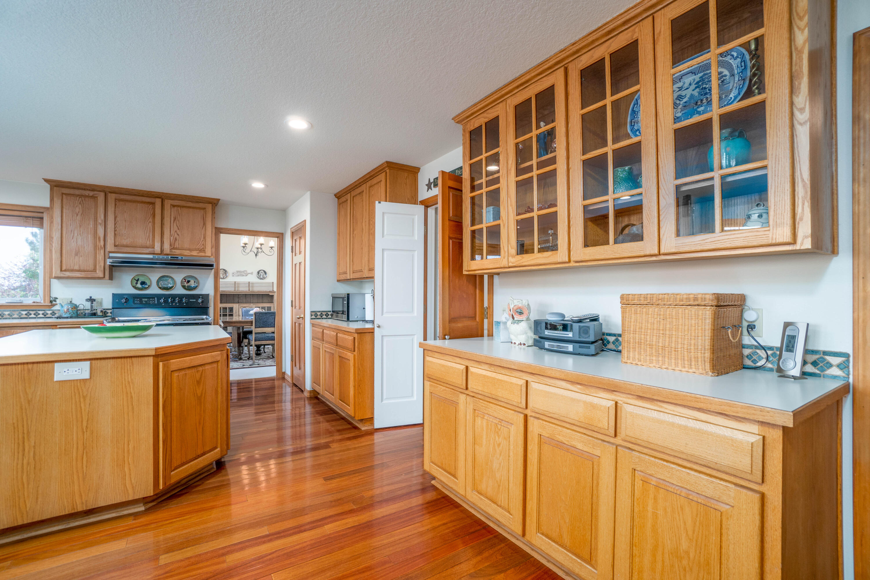 60905 Jennings Road Bend, OR 97702 - Photo 13 of 41 Pantry and display cupboards.