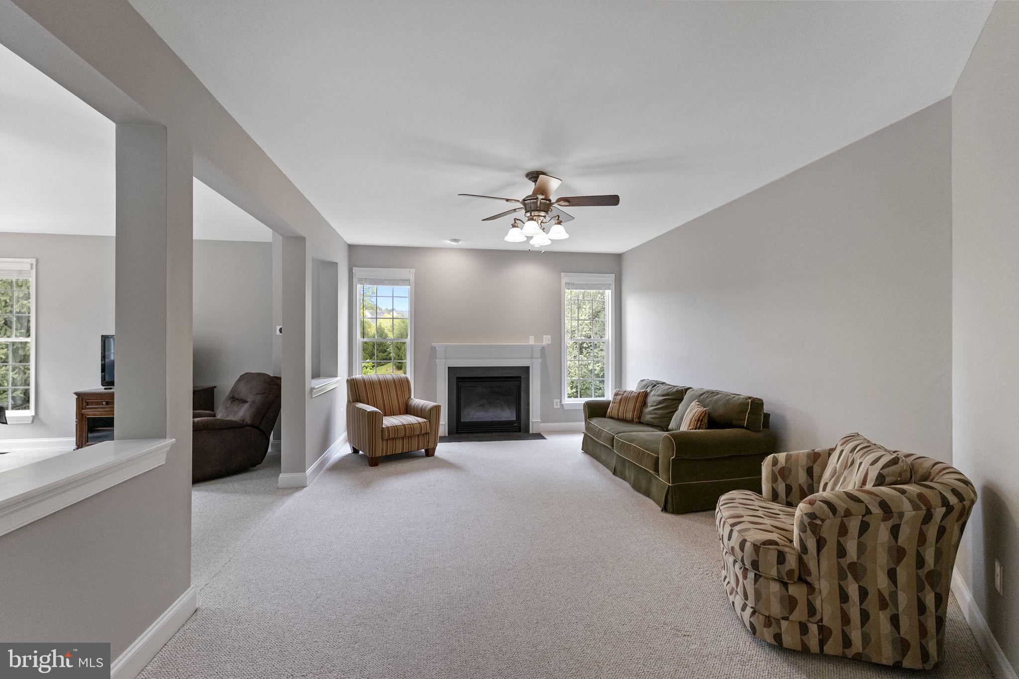 23128 Persimmon Ridge Road Clarksburg, MD 20871 - Photo 5 of 66 Curl up by the fire in the family room