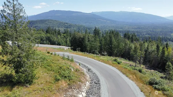 a view of a lake with a mountain