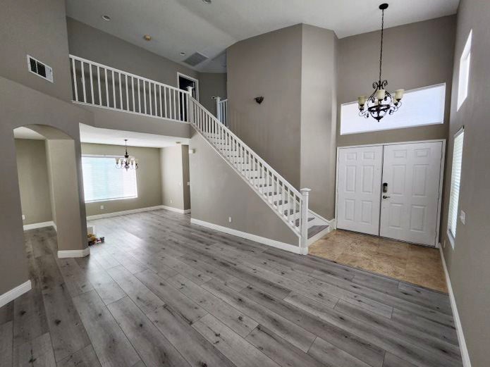 948 Bingham Drive Corona, CA 92882 - Photo 2 of 14 a view of an entryway with wooden floor