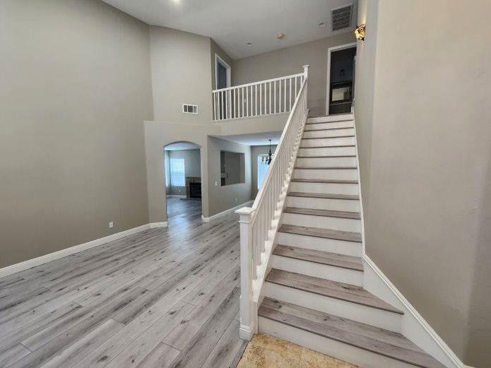 948 Bingham Drive Corona, CA 92882 - Photo 3 of 14 a view of entryway and hall with wooden floor