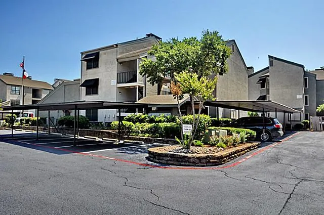 a front view of a building with street view