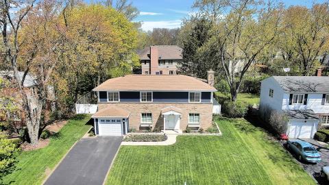 1248 Hackberry Road Deerfield, IL 60015 - Photo 2 of 40 a front view of a house with a yard