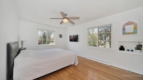 1248 Hackberry Road Deerfield, IL 60015 - Photo 22 of 40 a bedroom with a bed and a window