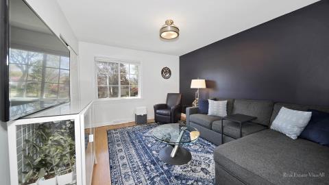 1248 Hackberry Road Deerfield, IL 60015 - Photo 27 of 40 a living room with furniture and a window