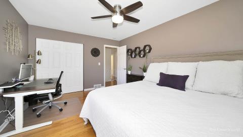 1248 Hackberry Road Deerfield, IL 60015 - Photo 32 of 40 a bedroom with a bed and a desk