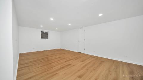 1248 Hackberry Road Deerfield, IL 60015 - Photo 36 of 40 a view of empty room with wooden floor
