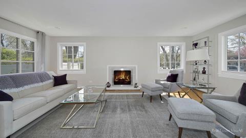 1248 Hackberry Road Deerfield, IL 60015 - Photo 6 of 40 a living room with furniture windows and a fireplace