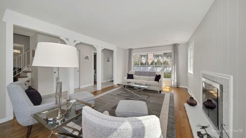 1248 Hackberry Road Deerfield, IL 60015 - Photo 7 of 40 a living room with furniture and a fireplace