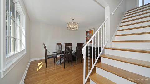 1248 Hackberry Road Deerfield, IL 60015 - Photo 9 of 40 a view of entryway and hall with wooden floor