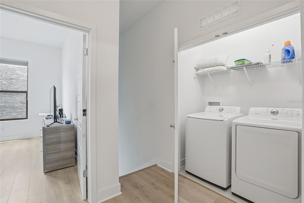 4810 West McElroy Avenue, Unit 30 Tampa, FL 33611 - Photo 32 of 43 a utility room with dryer and washer