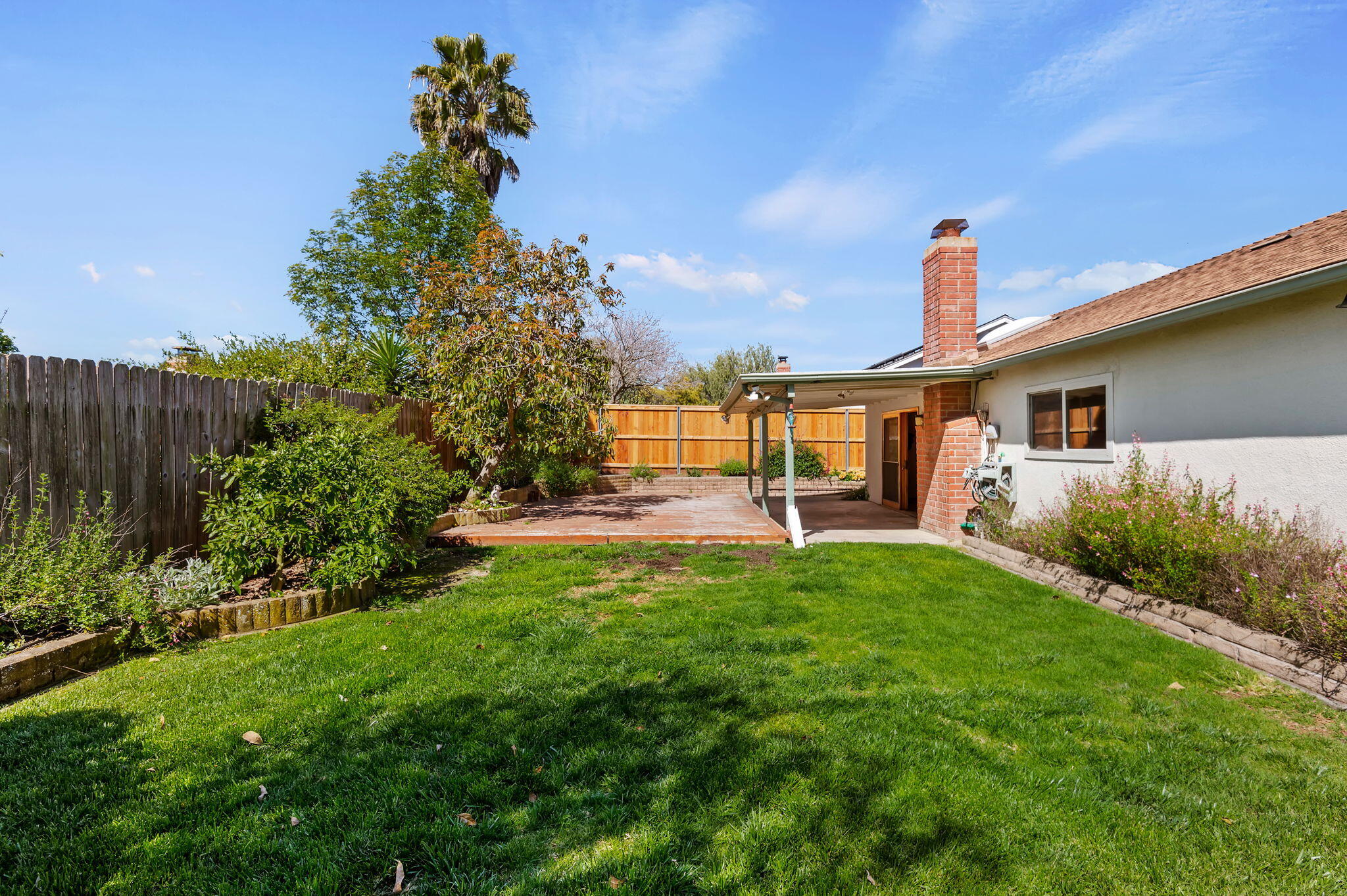 7397 Mirano Drive Goleta, CA 93117 - Photo 23 of 27 a front view of a house with garden