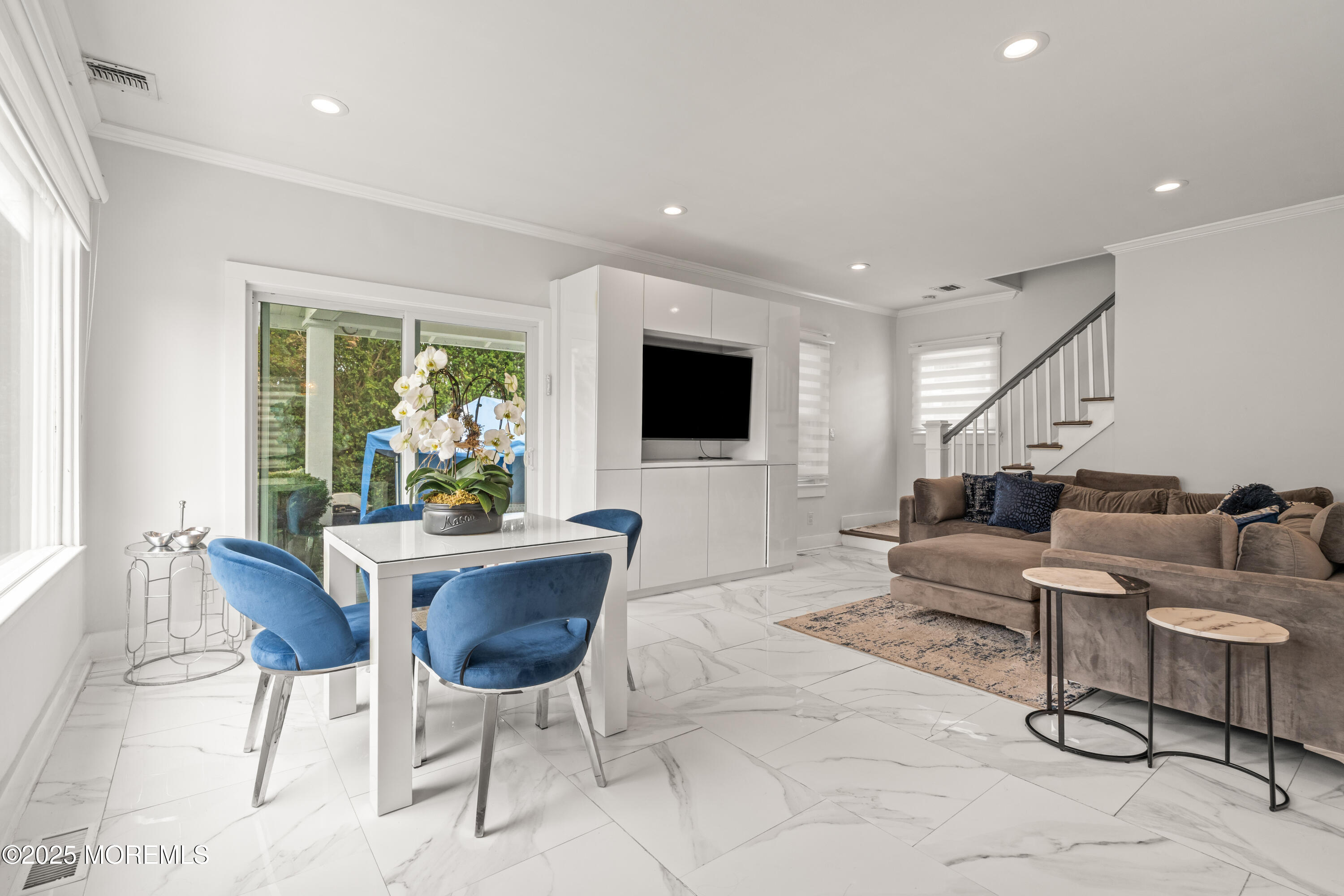 3 Reid Street Long Branch, NJ 07740 - Photo 13 of 54 a living room with furniture and a flat screen tv