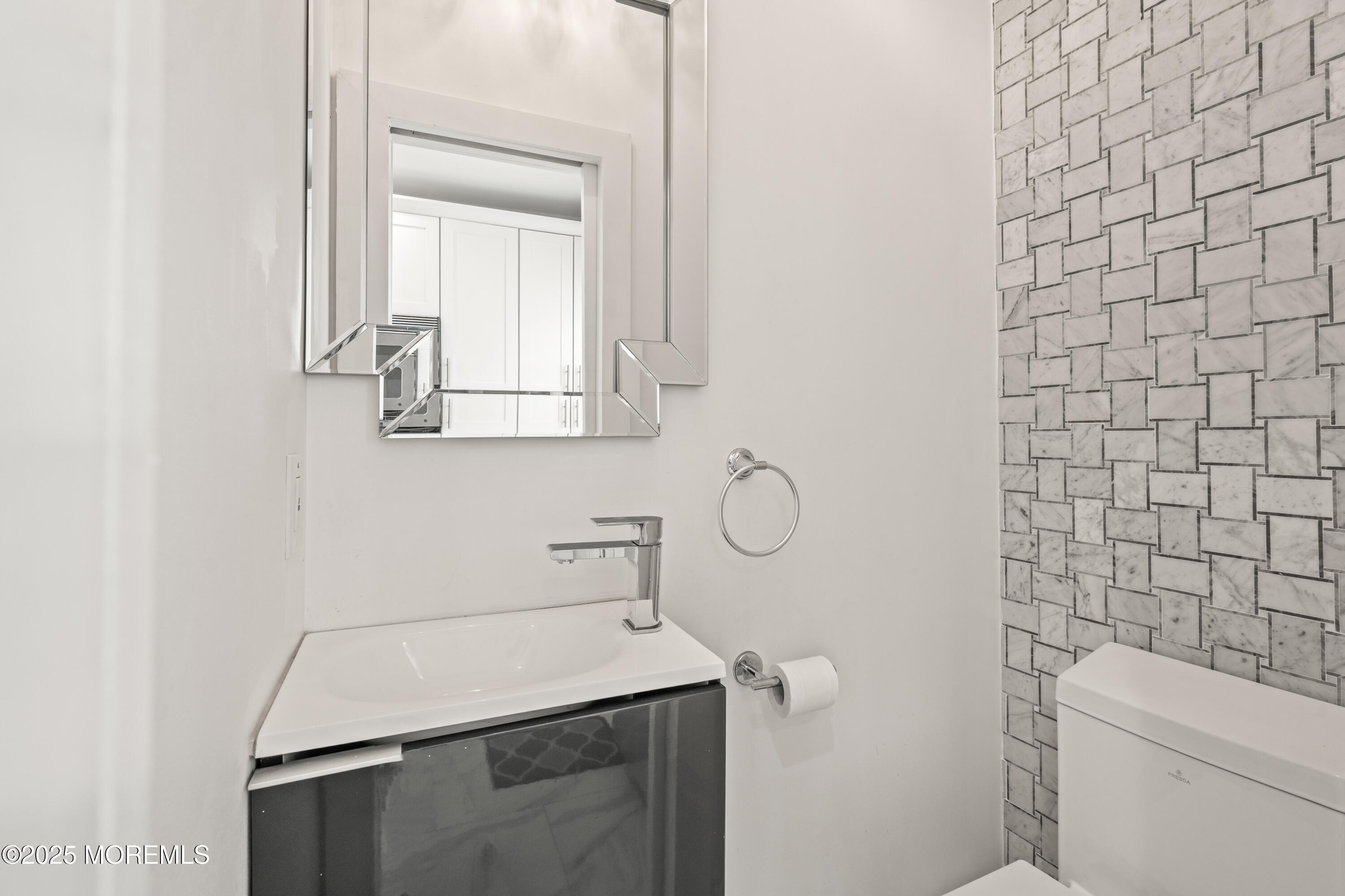 3 Reid Street Long Branch, NJ 07740 - Photo 20 of 54 a bathroom with a sink toilet and mirror