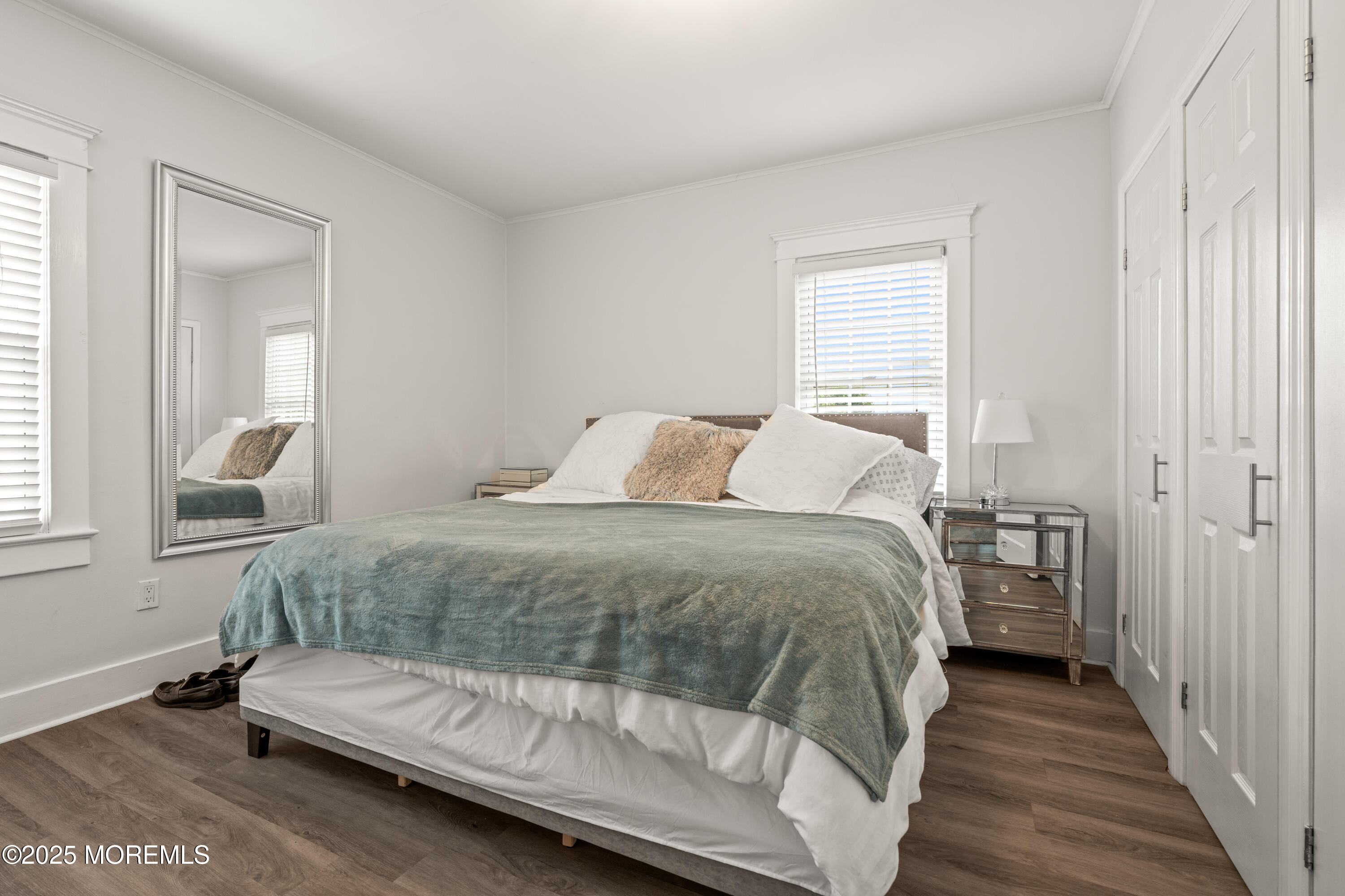 3 Reid Street Long Branch, NJ 07740 - Photo 26 of 54 a bedroom with a bed and wooden floor