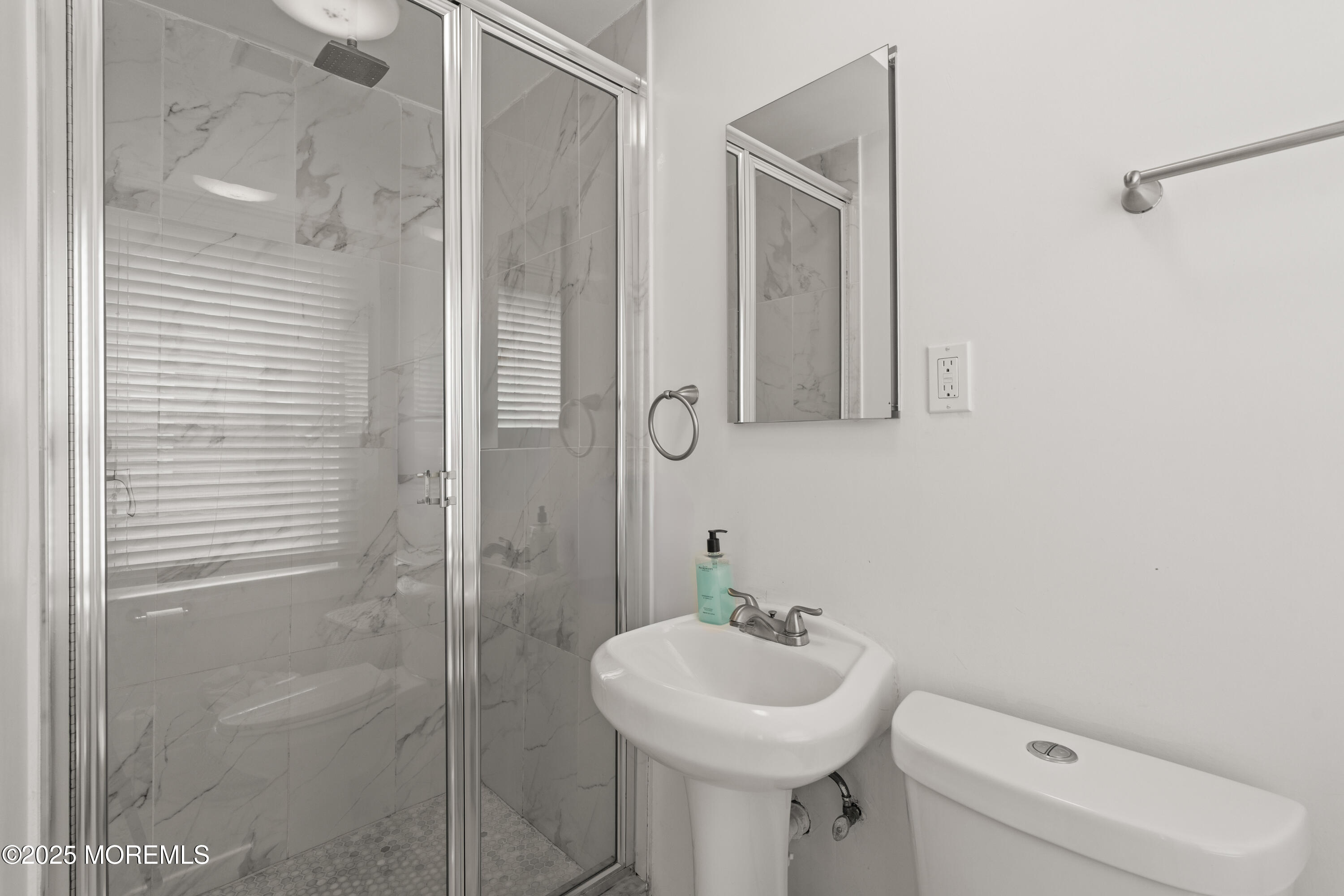 3 Reid Street Long Branch, NJ 07740 - Photo 39 of 54 a bathroom with a sink toilet and shower