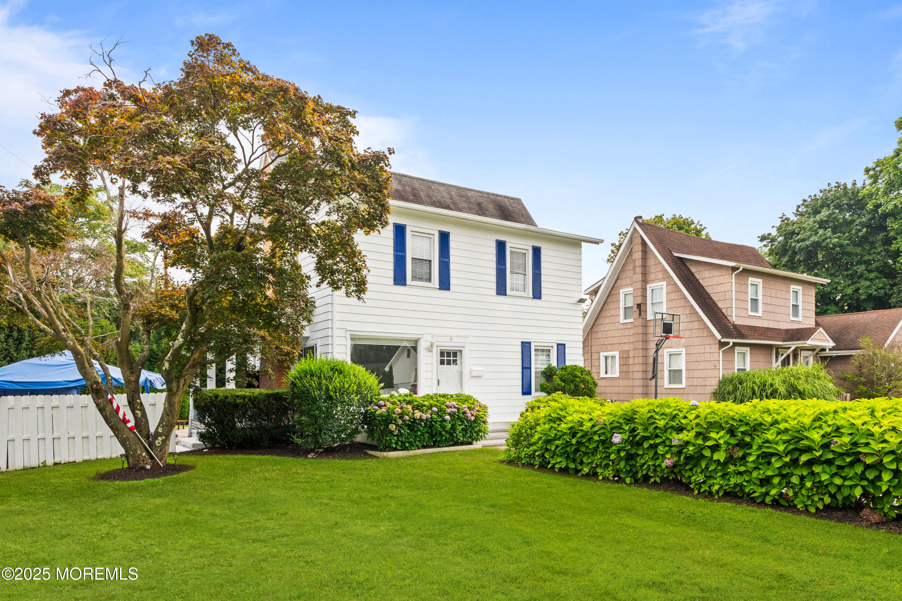 3 Reid Street Long Branch, NJ 07740 - Photo 48 of 54 a front view of a house with a garden