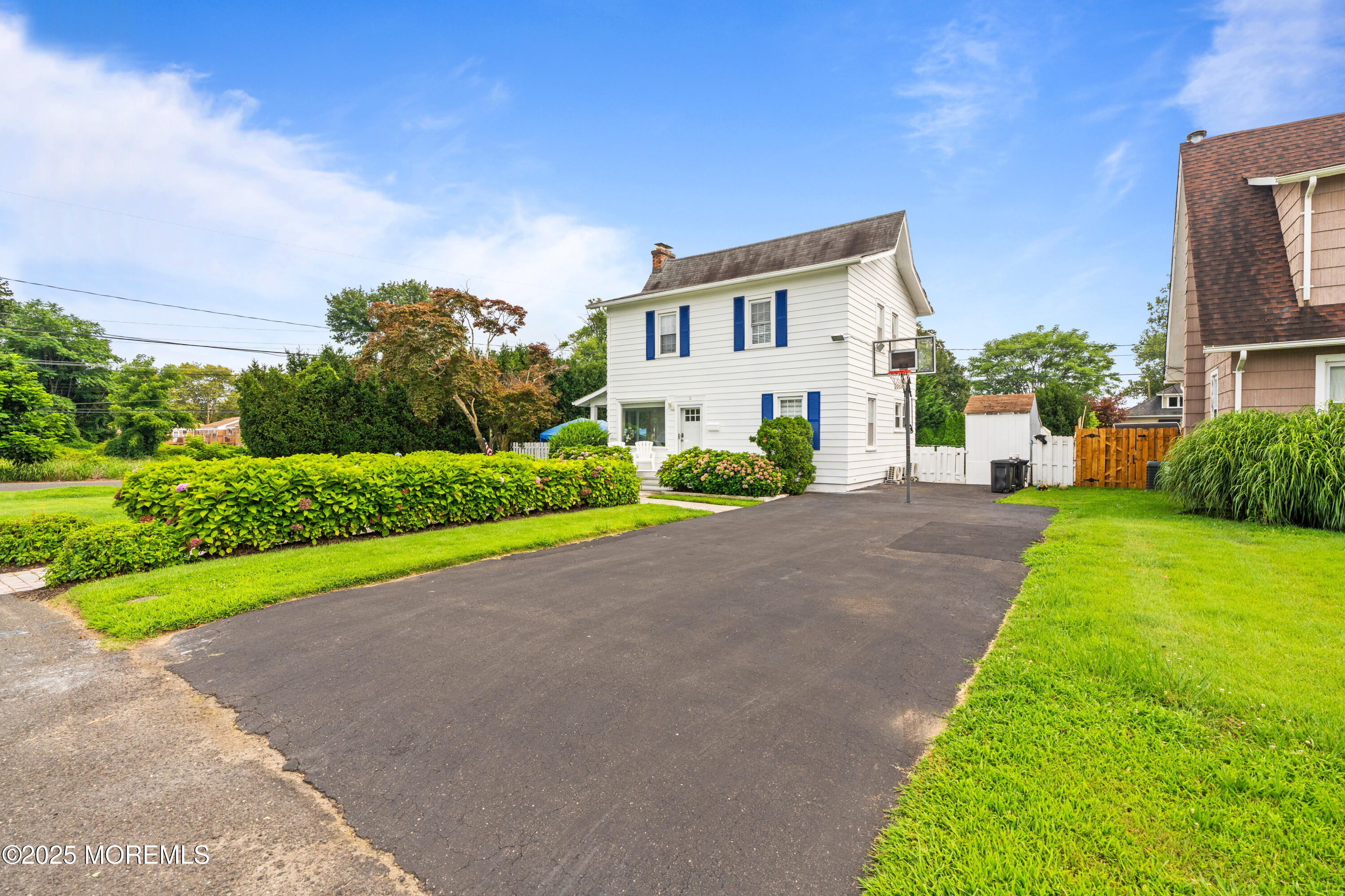 3 Reid Street Long Branch, NJ 07740 - Photo 49 of 54 a house with garden in front of it