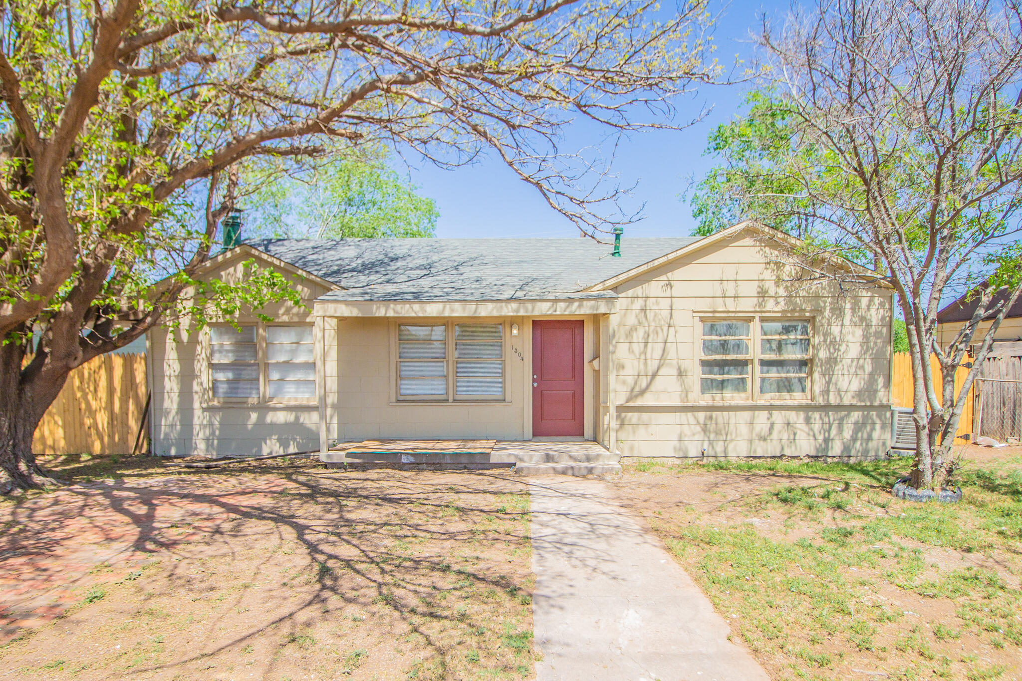 1304 42nd Street Lubbock, TX 79412 - Photo 2 of 17 a front view of a house