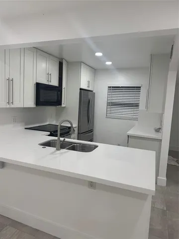 a view of hallway with shower